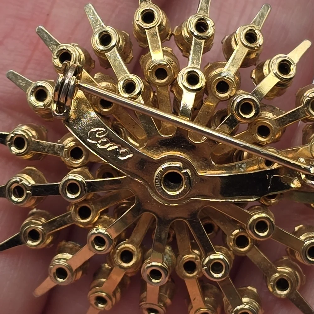 Vintage Coro Purple Rhinestone Starburst Gold Tone Brooch
